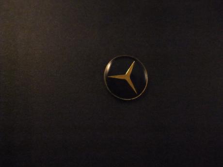 Mercedes logo donkerblauw- goudkleurige ster
